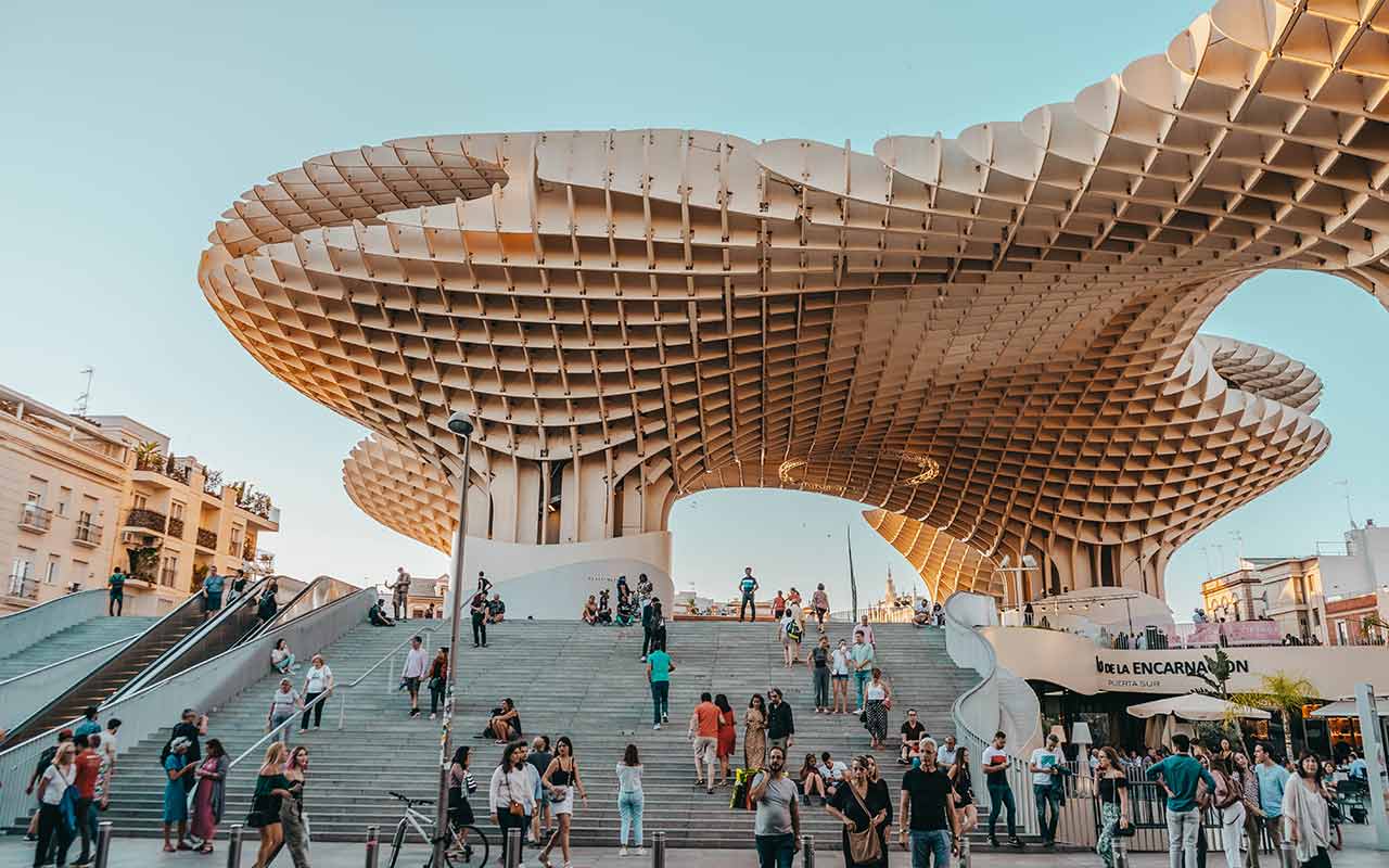 Tourists flock at Metrosol Parasol - a wooden structure that has become an icon for Seville, Spain