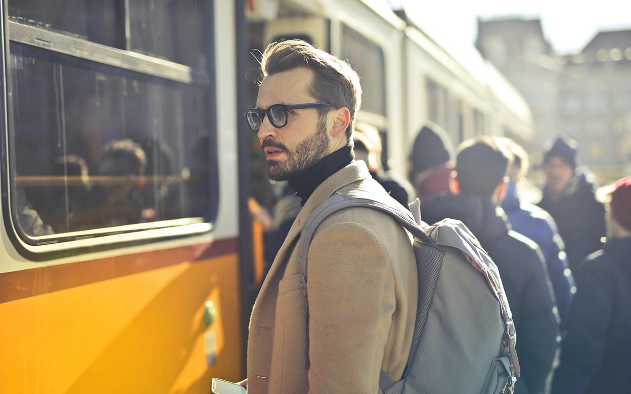 A tourist about ride a train in Budapest