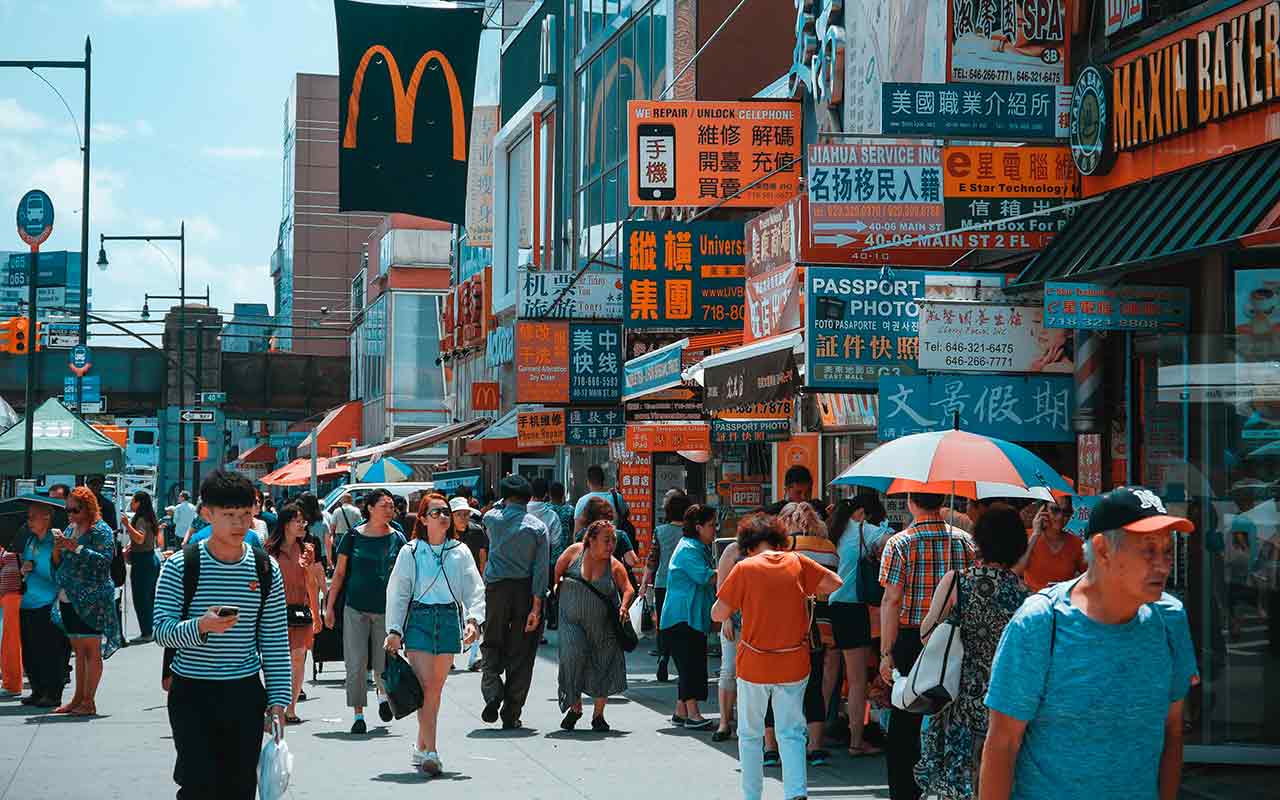 An Asian crowd in Chinatown at Queens, New York