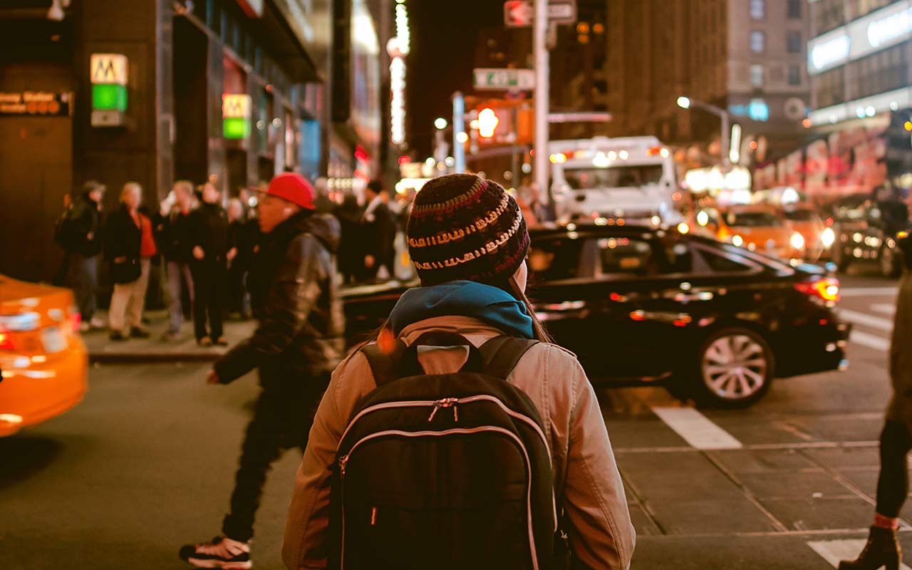 A tourist walking around the streets of New York