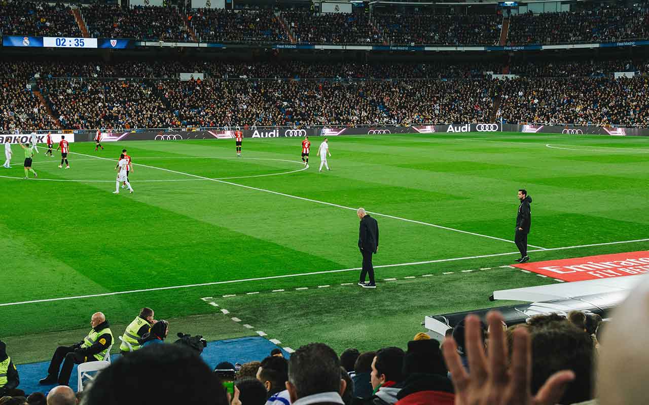 A professional football game inside Santiago Bernabéu Stadium 