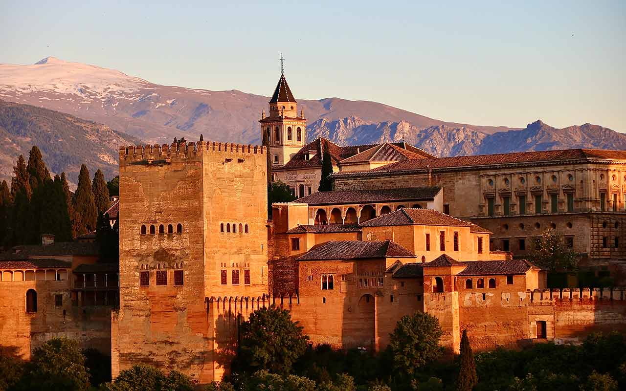 Alhambra Palace in Alhambra, Granada Spain during sunset